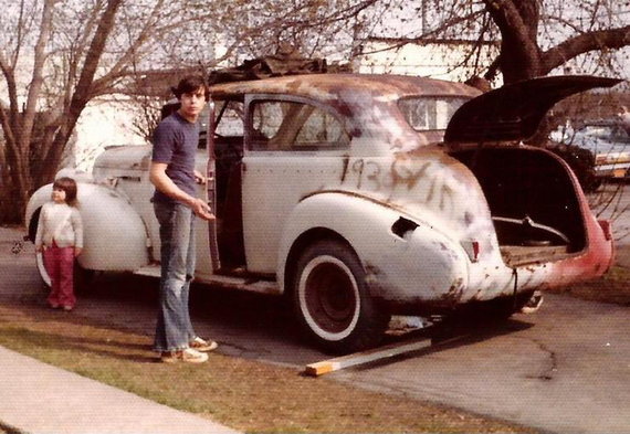 Undaunted by his age, a 14-year-old Alfred DiMora rebuilds a burned-out 1939 Buick in his driveway in the Gates Chili suburb of Rochester, New York. Photograph courtesy of Sir Alfred J. DiMora/DiMora Motorcar.